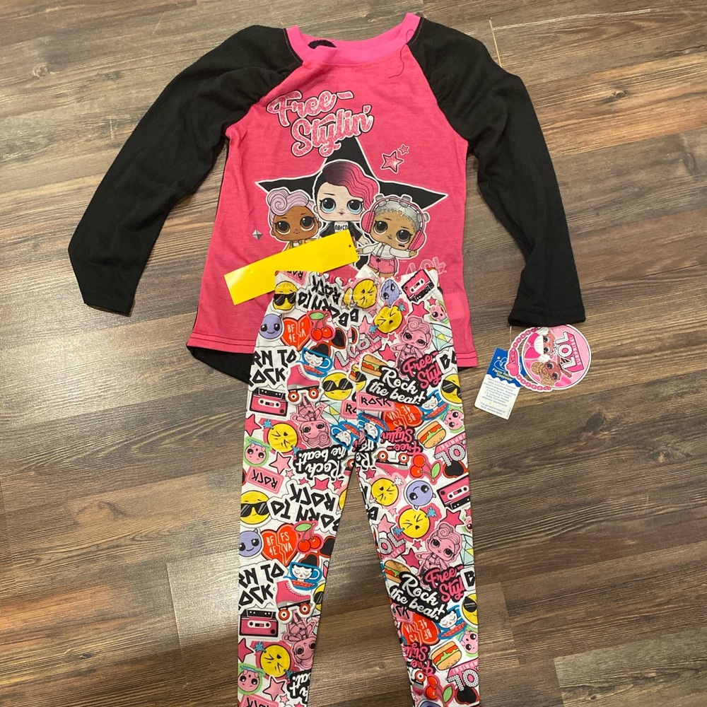 2 sets of pajamas with tags still on